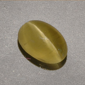 1.40 ct Yellow Cat's Eye Apatite Gemstone, Cat's Eye Apatite Gem in Oval Cabochon Shape for Sale.