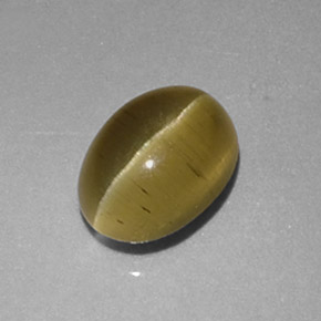 1.48 ct Yellow Cat's Eye Apatite Gemstone, Cat's Eye Apatite Gem in Oval Cabochon Shape for Sale.