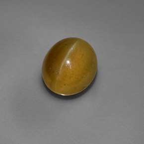 5.60 ct Green Cat's Eye Apatite Gemstone, Cat's Eye Apatite Gem in Oval Cabochon Shape for Sale.