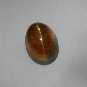 6.67 ct Yellow Cat's Eye Apatite Gemstone, Cat's Eye Apatite Gem in Oval Cabochon Shape for Sale.