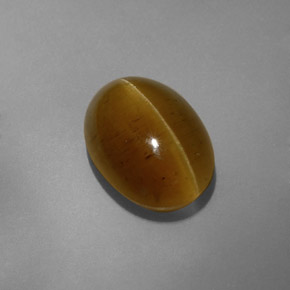 8.32 ct Yellow Cat's Eye Apatite Stone, Natural Cat's Eye Apatite in Oval Cabochon Shape for Sale