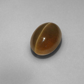 6.55 ct Yellow Cat's Eye Apatite Stone, Natural Cat's Eye Apatite in Oval Cabochon Shape for Sale