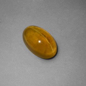 2.52 ct Yellow Cat's Eye Apatite Gemstone, Cat's Eye Apatite Gem in Oval Cabochon Shape for Sale.