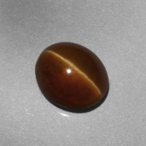 2.67 ct Orange Cat's Eye Apatite Gemstone, Cat's Eye Apatite Gem in Oval Cabochon Shape for Sale.