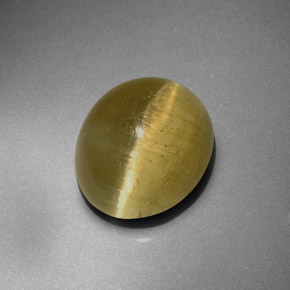 20.8ct Oval Cabochon Greenish Golden Cat's Eye Apatite for sale thumb image of 20.8ct Oval Cabochon Greenish Golden Cat's Eye Apatite (ID: 385349)