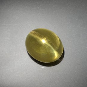 8.38 ct Green Cat's Eye Apatite Gemstone, Cat's Eye Apatite Gem in Oval Cabochon Shape for Sale.