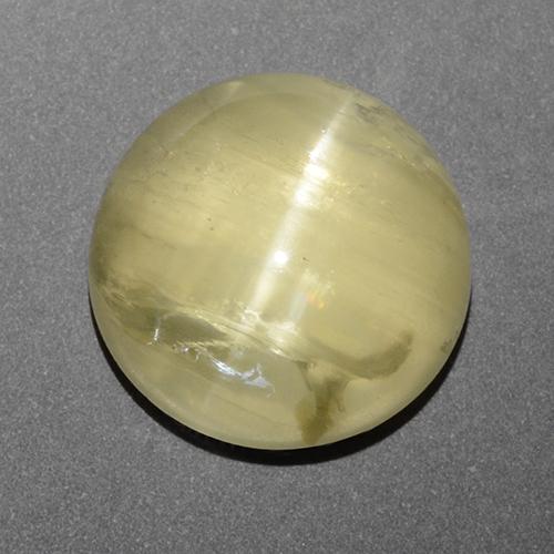 18.1ct Round Cabochon Golden Green Cat's Eye Apatite for sale thumb image of 18.1ct Round Cabochon Golden Green Cat's Eye Apatite (ID: 406294)
