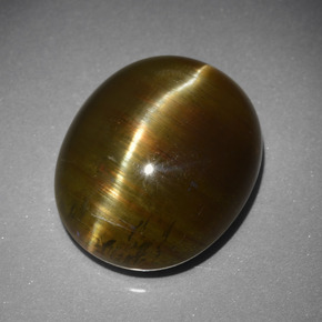 15.4ct Oval Cabochon Greenish Golden Cat's Eye Apatite for sale thumb image of 15.4ct Oval Cabochon Greenish Golden Cat's Eye Apatite (ID: 413959)