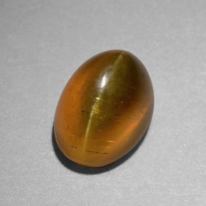6.55 ct Gold Cat's Eye Apatite Stone, Natural Cat's Eye Apatite in Oval Cabochon Shape for Sale