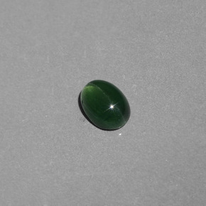 1.09 ct Green Cat's Eye Apatite Gemstone, Cat's Eye Apatite Gem in Oval Cabochon Shape for Sale.
