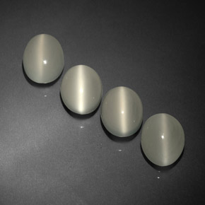 8.26 ct White Cat's Eye Moonstone Gemstone, Cat's Eye Moonstone Gem in Oval Cabochon Shape for Sale.