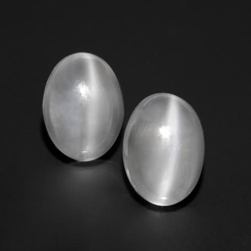 Paire Oeil de chat de la Pierre de Lune Ovale 8,1 x 6,1mm assorties - Poids total 3,04 ct / moyenne 1,52 ct chacune, couleur Blanc et pureté Transparent, pierre gemme naturelle Non traité, dureté de Mohs 6 à 6.5, Photo A
