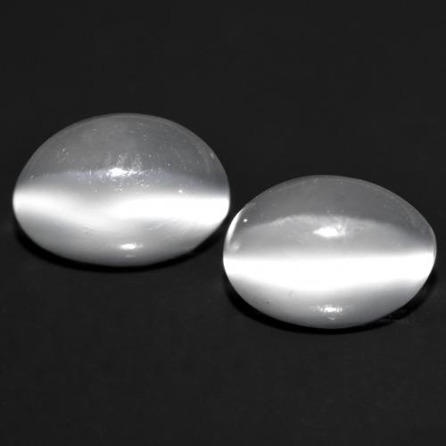 2 piezas de Piedra de Luna Ojo de Gato Blanco Ovalada a juego en tamaño 7 x 5,1mm, peso 1,98 ct en total / promedio. 0,99 ct cada uno, Blanco en claridad Transparente, piedra preciosa natural No tratado, dureza de Mohs 6 - 6.5, Photo A