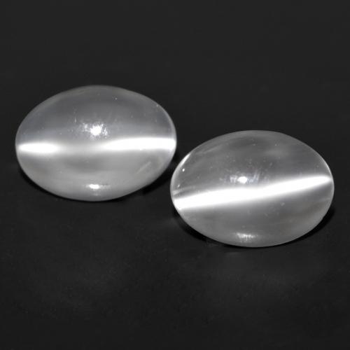 Par de Piedra de Luna Ojo de Gato Ovalada a juego de 7 x 5,1mm - Peso 1,39 ct en total / promedio. 0,7 ct cada uno, color Blanco claro en claridad Transparente, piedra preciosa natural No tratado, dureza de Mohs 6 - 6.5, Photo A