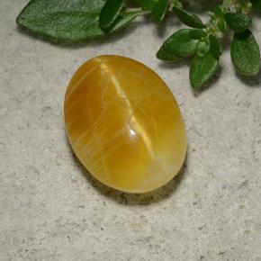 2.8ct Oval Cabochon Yellow Orange Cat's Eye Opal Gem for sale 2.8ct Oval Cabochon Yellow Orange Cat's Eye Opal Gem (ID: 493515)