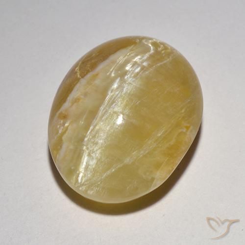 Opale Occhio di Gatto Ovale cabochon da 6,21 ct dal Madagascar, dimensione 13,6 x 10,6mm, purezza Translucent, pietra preziosa naturale non trattati, Opale Occhio di Gatto 1pc in colore Giallo medio, durezza Mohs di 5,5 - 6,5, Photo A