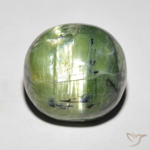 Opale Occhio di Gatto verde taglio ovale da 9,37 ct dal Brasile, dimensione 13,8 x 13,3mm, pietra preziosa naturale non trattati , purezza Opaque, Opale Occhio di Gatto Ovale cabochon da 1 pz, durezza Mohs di 5,5 - 6,5, Photo A