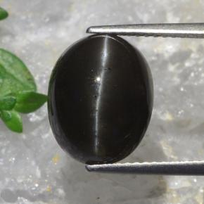 7.3ct Oval Cabochon Deep Brown Cat's Eye Scapolite for sale thumb image of 7.3ct Oval Cabochon Deep Brown Cat's Eye Scapolite (ID: 470140)