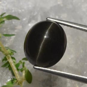 7.9ct Oval Cabochon Deep Brown Cat's Eye Scapolite for sale thumb image of 7.9ct Oval Cabochon Deep Brown Cat's Eye Scapolite (ID: 470306)