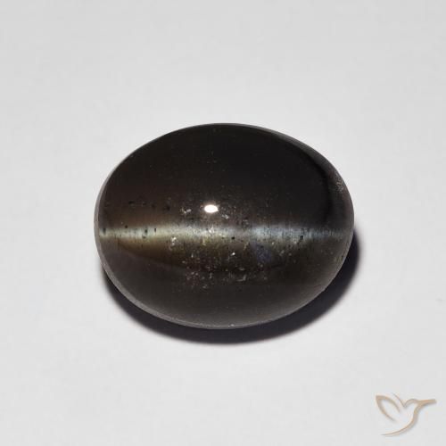 Oeil de chat Scapolite Noire oval cabochon 11,2 x 8,9mm de Madagascar, poids de 5,36 ct, pierre gemme naturelle Non traité de pureté Opaque , 1 pièce Oeil de chat Scapolite, couleur : Noire, dureté de Mohs de 5.5 à 6, Photo A