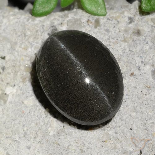 Scapolite effetto occhio di gatto nero taglio ovale da 2,15 ct dal Madagascar, dimensione 8,8 x 6,5mm, pietra preziosa naturale non trattati , purezza Translucent, Scapolite effetto occhio di gatto Ovale cabochon da 1 pz, durezza Mohs di 5,5 - 6, Photo A
