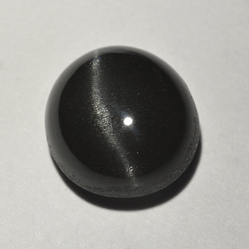Oeil de chat Scapolite Noire Ovale 9 x 8,5mm de Madagascar, poids de 2,91 ct, pierre gemme naturelle Non traité de pureté Translucide, 1 pièce Oeil de chat Scapolite oval cabochon, couleur : Noire, dureté de Mohs de 5.5 à 6, Photo A