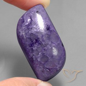 53.73 ct Fancy Charoite, 33.4 x 17.8 mm From Russia, Photo A