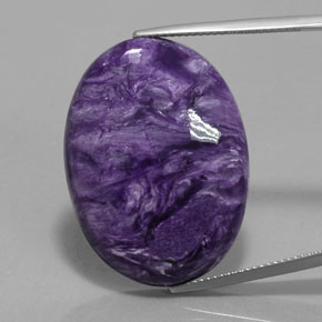 28.09 ct Violet Charoite Gemstone, Charoite Gem in Oval Cabochon Shape for Sale.