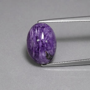 5.27 ct Violet Charoite Gemstone, Charoite Gem in Oval Cabochon Shape for Sale.