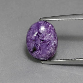 2.06 ct Violet Charoite Gemstone, Charoite Gem in Oval Cabochon Shape for Sale.