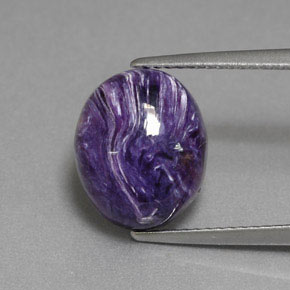 5.56 ct Violet Charoite Gemstone, Charoite Gem in Oval Cabochon Shape for Sale.