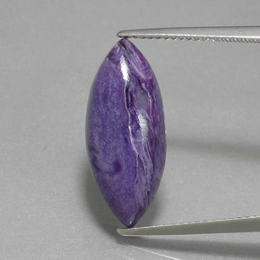 6.82 ct Violet Charoite Gemstone, Charoite Gem in Marquise Cabochon Shape for Sale.