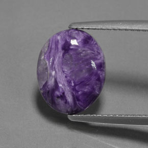 3.56 ct Violet Charoite Gemstone, Charoite Gem in Oval Cabochon Shape for Sale.