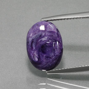 5.03 ct Violet Charoite Gemstone, Charoite Gem in Oval Cabochon Shape for Sale.