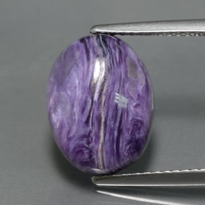 5.26 ct Violet Charoite Gemstone, Charoite Gem in Oval Cabochon Shape for Sale.