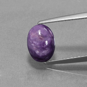1.54 ct Violet Charoite Gemstone, Charoite Gem in Oval Cabochon Shape for Sale.