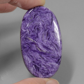 52.34 ct Violet Charoite Gemstone, Charoite Gem in Oval Cabochon Shape for Sale.