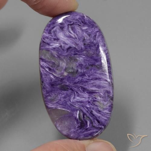 50.99 ct Oval Charoite, 39.7 x 22.3 mm From Russia, Photo A