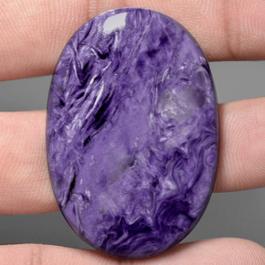 84.93 ct Violet Charoite Gemstone, Charoite Gem in Oval Cabochon Shape for Sale.