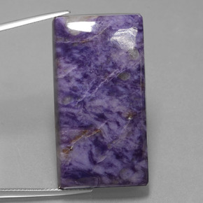 67.35 ct Violet Charoite Gemstone, Charoite Gem in Baguette Cabochon Shape for Sale.