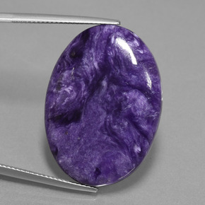 26ct Oval Cabochon Violet Charoite for sale thumb image of 26ct Oval Cabochon Violet Charoite (ID: 452222)