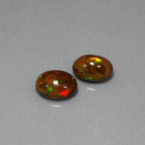 1.74 ct Multicolor Chocolate Opal Gemstone, Chocolate Opal Gem in Oval Cabochon Shape for Sale.