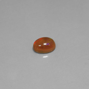0.63 ct Multicolor Chocolate Opal Gemstone, Chocolate Opal Gem in Oval Cabochon Shape for Sale.