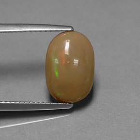 2.59 ct Multicolor Chocolate Opal Gemstone, Chocolate Opal Gem in Oval Cabochon Shape for Sale.