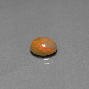 0.85 ct Multicolor Chocolate Opal Gemstone, Chocolate Opal Gem in Oval Cabochon Shape for Sale.