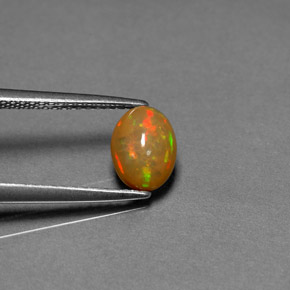 0.68 ct Multicolor Chocolate Opal Stone, Natural Chocolate Opal in Oval Cabochon Shape for Sale