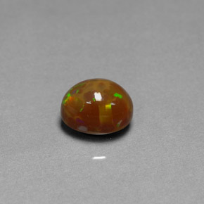 2.17 ct Multicolor Chocolate Opal Gemstone, Chocolate Opal Gem in Oval Cabochon Shape for Sale.