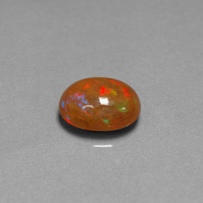 2.03 ct Multicolor Chocolate Opal Gemstone, Chocolate Opal Gem in Oval Cabochon Shape for Sale.