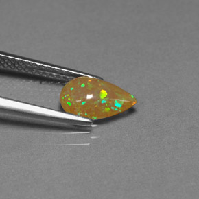 0.67 ct Multicolor Chocolate Opal Gemstone, Chocolate Opal Gem in Pear Cabochon Shape for Sale.