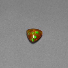 0.52 ct Multicolor Chocolate Opal Gemstone, Chocolate Opal Gem in Trillion Cabochon Shape for Sale.
